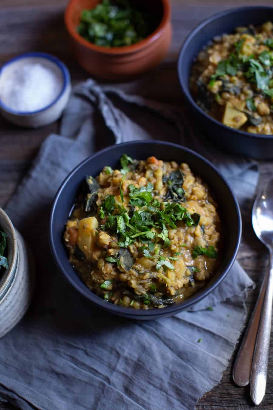 Hearty Mung Bean Stew With Kale served in bowls.