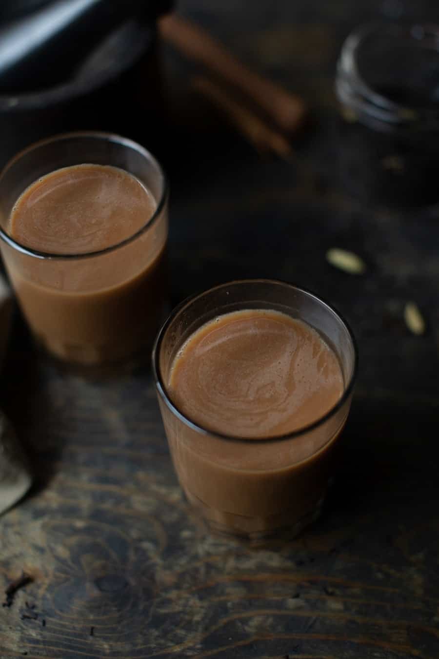 Spiced Coconut Chai in a glass close up.