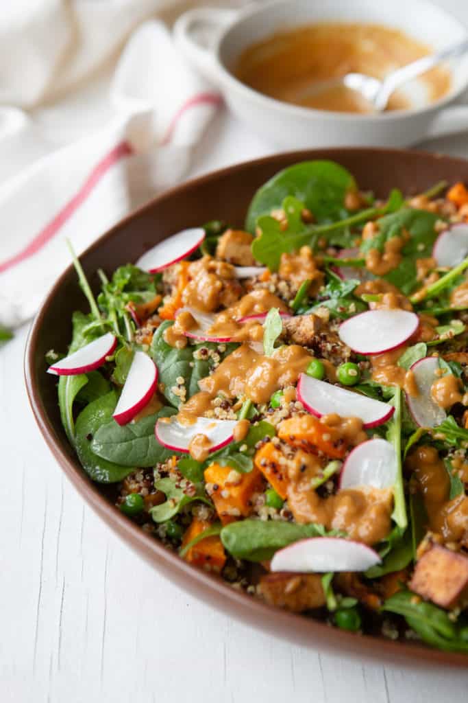 High protein salad with peanut sauce over the top.