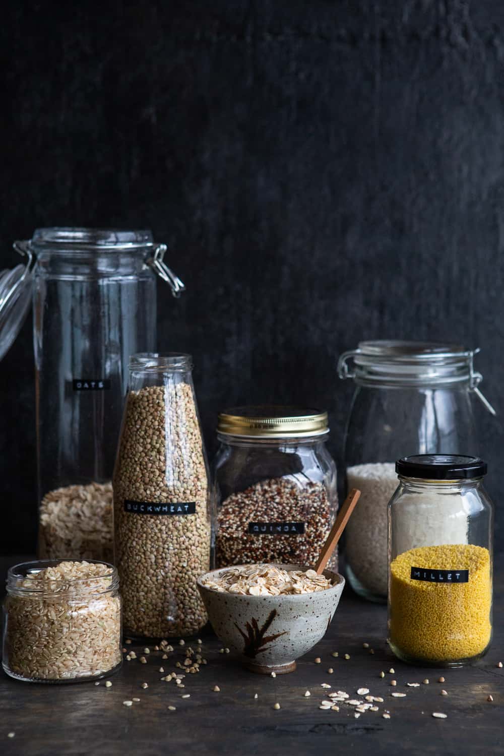 An assortment of jars with grains.