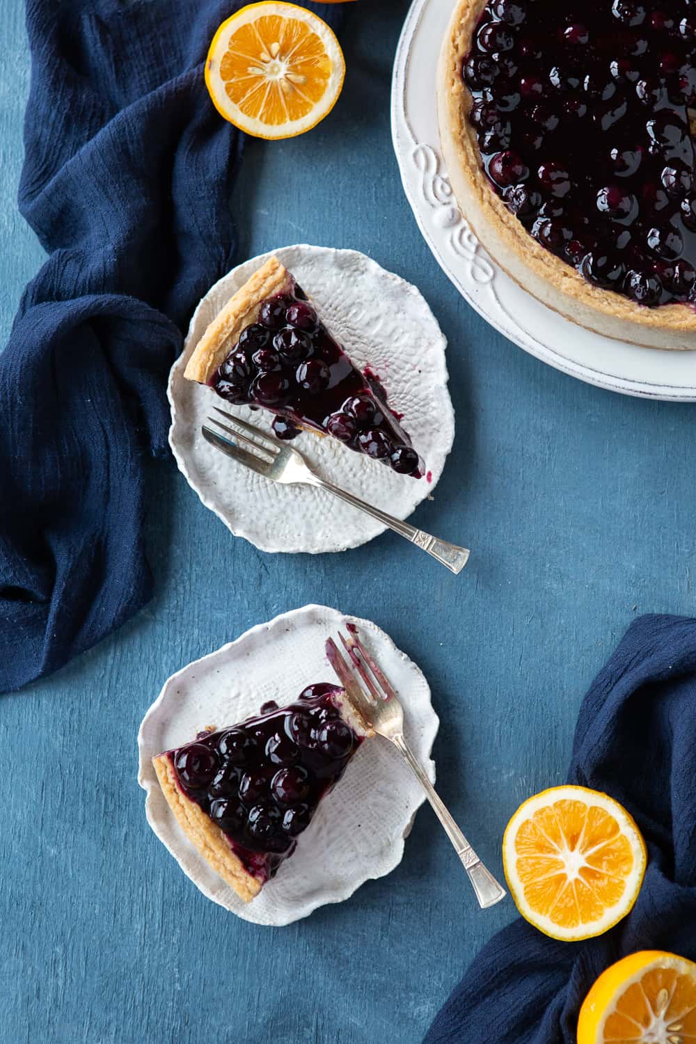 Baked Vegan Blueberry Cheesecake two slices shot from above