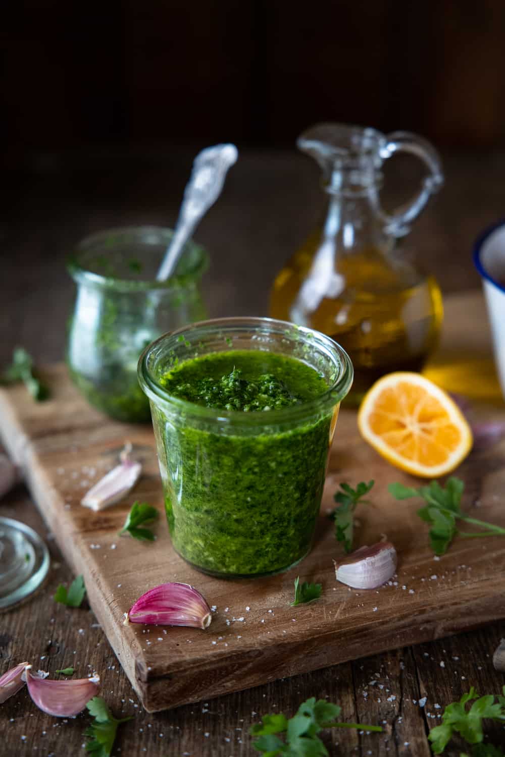 Easy Garlic Parsley Sauce with ingredients scattered around