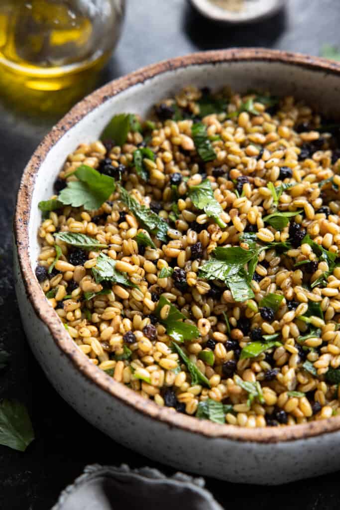 Farro with herbs and spices in a bowl.
