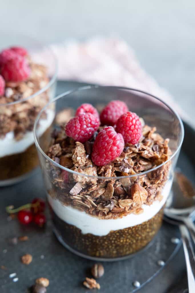 coffee chia pudding parfait in glasses close up.