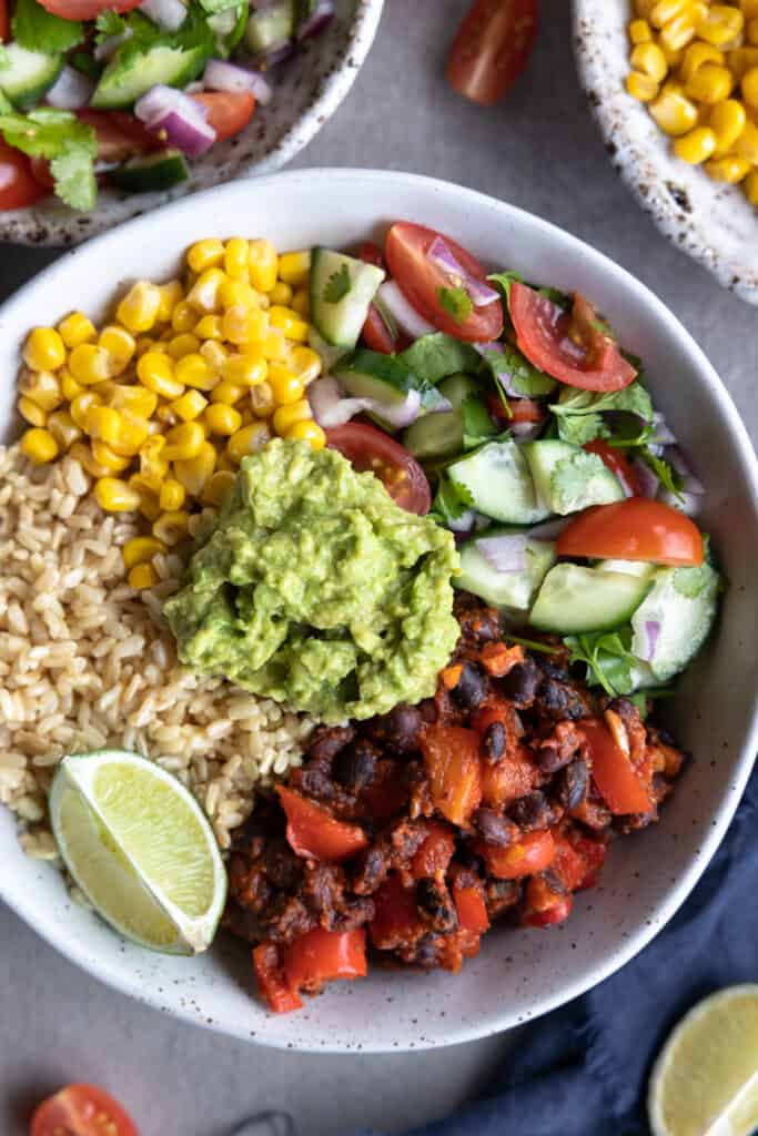 Healthy vegan burrito bowl shot from above in a bowl - close up.
