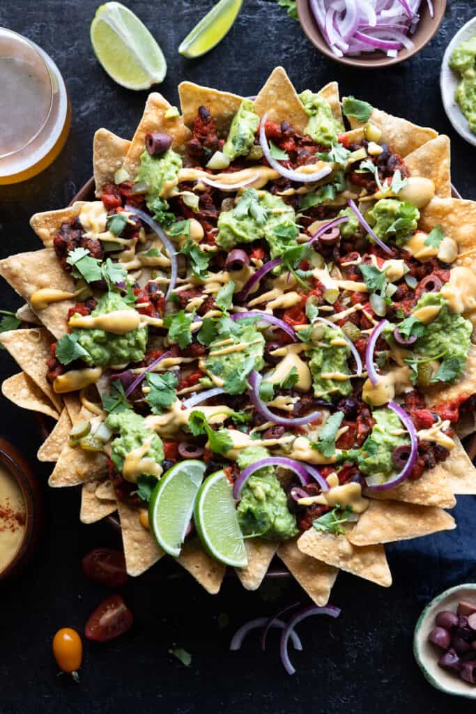 Vegan Fully Loaded Nachos in an oval large plate.