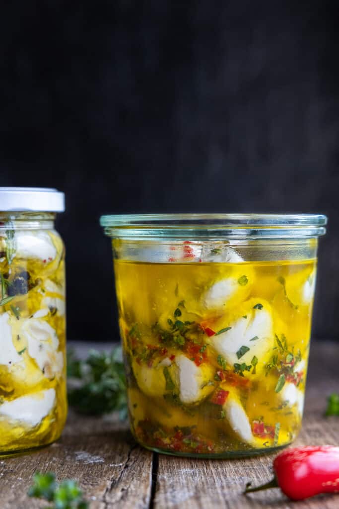 Marinated Vegan Bocconcini in herbs, chilli and oil.