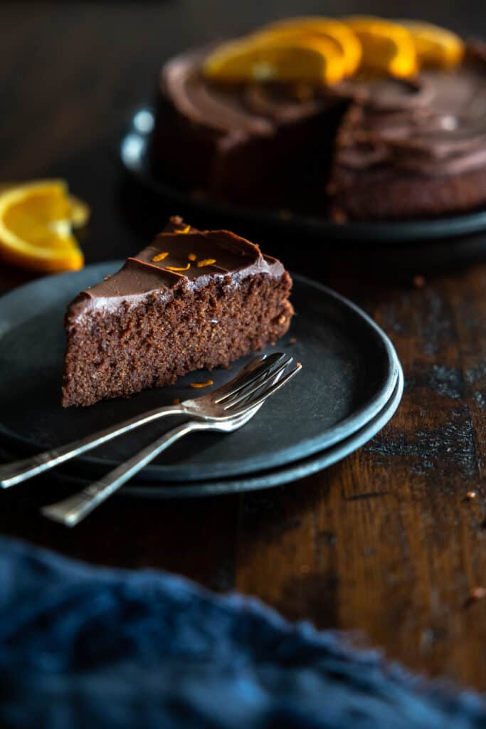 A slice of gluten free vegan chocolate orange cake.