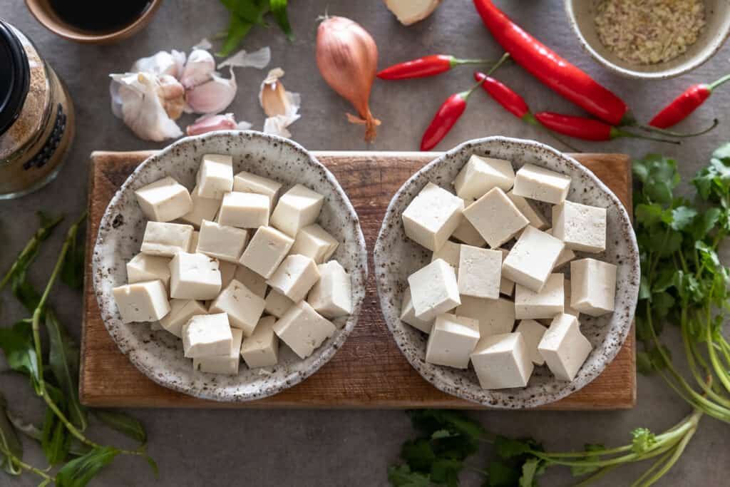 Left has medium-firm tofu and the other bowl on the right has firm-extra firm tofu. 